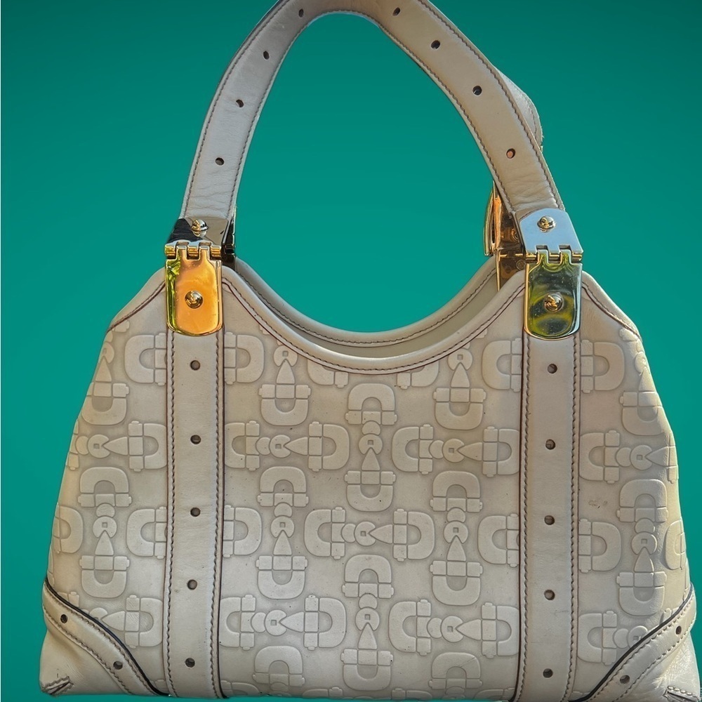 Gorgeous embossed horse it Gucci